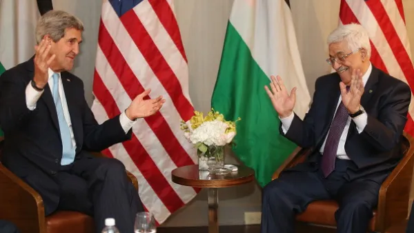 Secretary of State John Kerry with Palestinian Authority President Mahmoud Abbas. [Mario Tama/Getty Images]