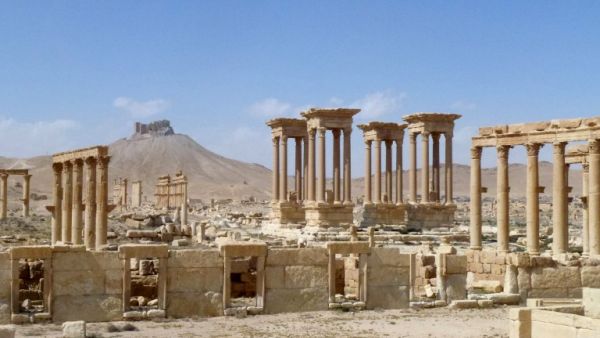 Parts of the ancient city of Palmyra remained relatively intact under Daesh control, but two temples were completely destroyed. (AFP/File)