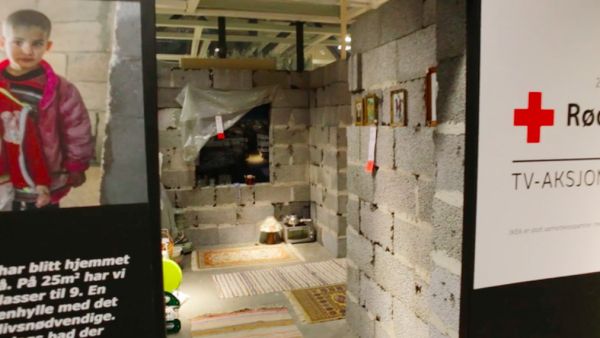 IKEA set up a replica of a typical home of a refugee in Damascus in their showroom in Slependen, Norway, to raise money for the Red Cross' efforts in Syria. (IKEA)
