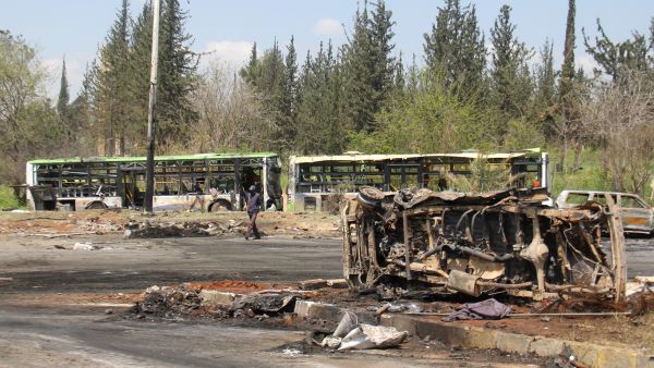 The wreckage of buses targeted by a car bomb in Aleppo, Syria, killing at least 112. (AFP/Omar Haj Kadour) 