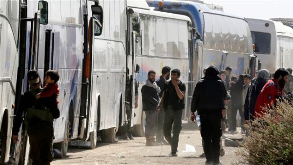 The convoy of 15 buses carried 700 evacuees, including 60 children and 30 women. (AFP/ File)