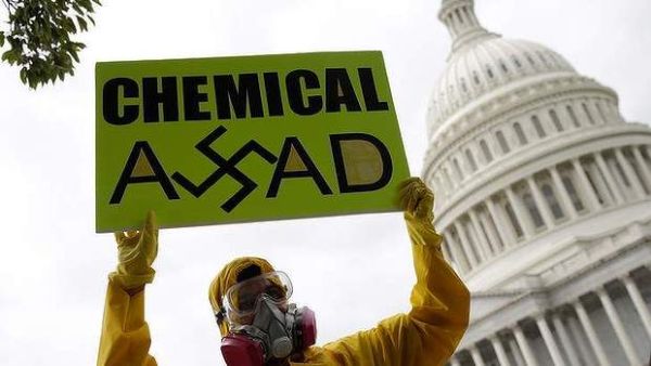 Syrian-American protesters outside the U.S. Capitol urging to strike Syria for using chemical weapons against civilians. (AFP/ File Photo) 