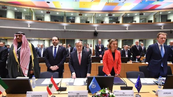 Kuwait's Foreign Minister Sabah Al Khalid Al Sabah, Lebanon's Prime Minister Saad Hariri, UN Secretary General Antonio Guterres, EU foreign policy chief Federica Mogherini and Norway's Foreign Minister Borge Brende mark a minute of silence for the victims of Khan Sheikhun, at an EU-Syria conference on the future of Syria and the region on April 5, 2017. (AFP/Emmanuel Dunand)