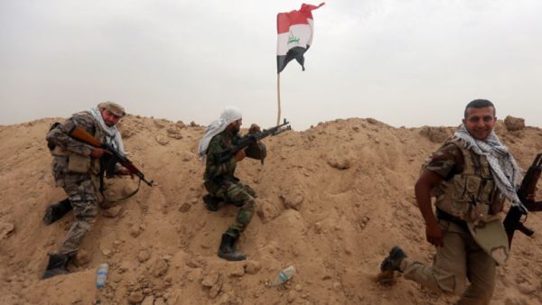 Members of the Iran-backed Shiite militia Popular Mobilization Forces in Iraq. (AFP/ File Photo)
