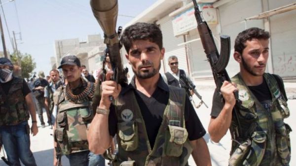 Syrian opposition pledge to continue its anti-Assad revolt as pro-regime forces draw closer to taking full control of the besieged enclave of Eastern Ghouta. (AFP/ File Photo)