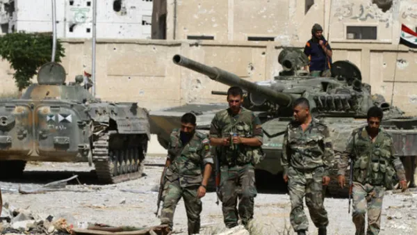 Syrian regime forces, in control of southern city of Daraa, are moving towards the Israeli-occupied Golan Heights. (AFP/ File Photo)