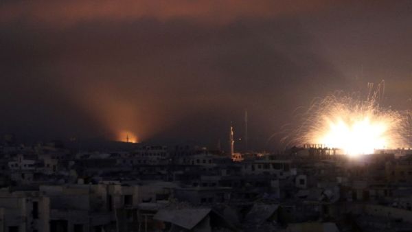 Explosions light the sky over the rebel enclave of Eastern Ghouta. (AFP, Photo/Mohammed Eyad)