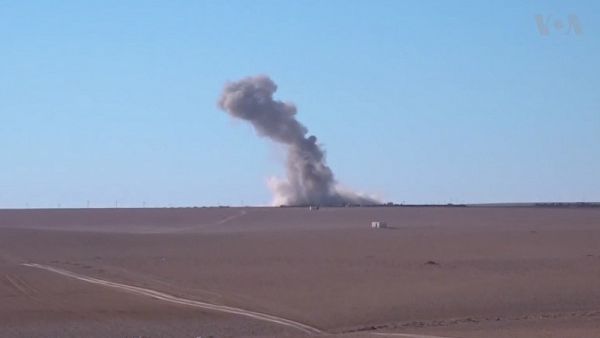 A US airstrike hits the area to the north of Raqqa in December 2016. It is not yet known who carried out Wednesday's airstrike in al-Dablan. (file photo)