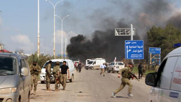 Smoke billowing following a suicide car bombing in Rashidin, west of Aleppo, that targeted buses carrying Syrians evacuated from two besieged government-held towns of Fuaa and Kafraya. (AFP)