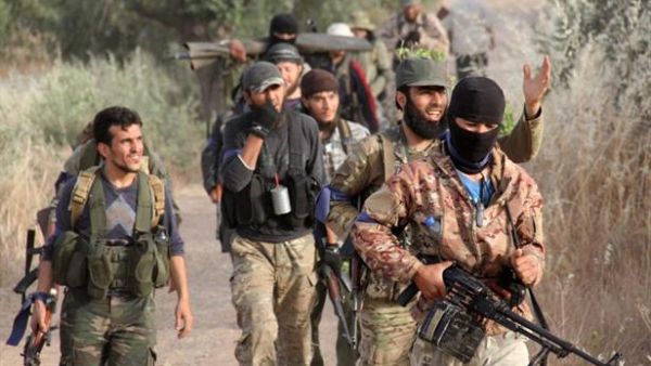 Rebels move through Idlib. (AFP/Omar Haj Kadour)