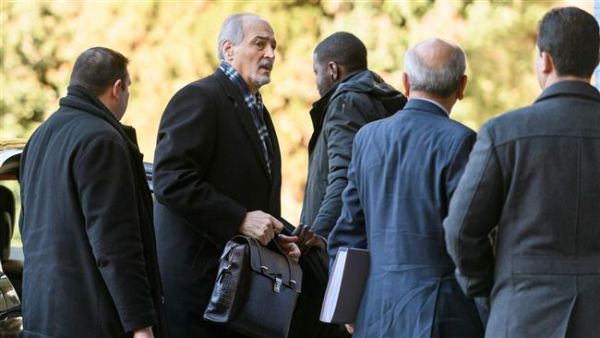 Syria's United Nations ambassador and head of the government delegation Bashar al-Ja’afari (2nd L) leaves after a meeting with UN Special Envoy for Syria Staffan de Mistura during the first day of a new round of Syria peace talks in Geneva, Switzerland, on February 23, 2017. (AFP/File) 