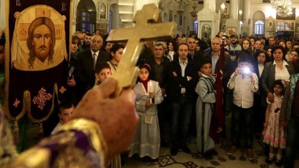 Greek Orthodox Christians attend a Good Friday mass at the Meriamiah Church in the Syrian capital Damascus. (AFP/File)