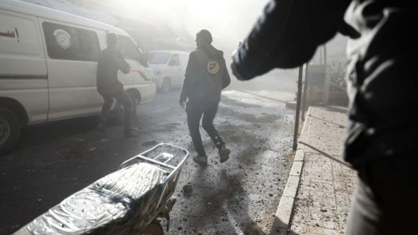 Syrian civil defense volunteers, known as the White Helmets, search for survivors following reported government airstrike on the rebel-held town of Douma, east of Damascus, on February 19, 2017. (AFP/Sameer al-Doumy)