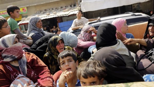2,000 Syrian refugees reportedly stranded in Lebanon mountains. (AFP)