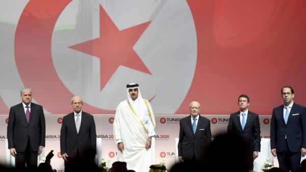 Algerian Prime Minister Abdelmalek Sellal: Tunisian Assembly President Mohamed Ennaceur; the Emir of Qatar, Tamim bin Hamad al-Thani; Tunisian President Beji Caid Essebsi, French Prime Minister Manuel Valls and Tunisian Prime Minister Youssef Chahed at Tunisia 2020.  (AFP/Fethi Belaid)