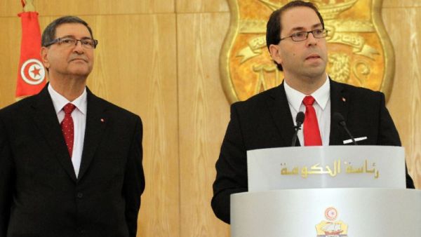 Tunisia's Prime Minister Youssef Chahed delivering a speech during a ministry handover ceremony in Tunis in August 2016. (AFP/File) Tunisia's Prime Minister Youssef Chahed delivering a speech during a ministry handover ceremony in Tunis in August 2016. (AFP/File)