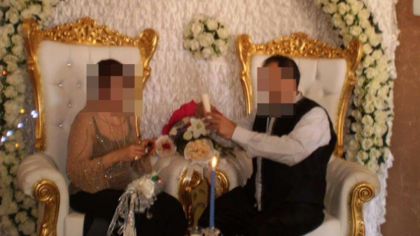 A picture of the newly-married couple, with faces blurred for privacy. (File)