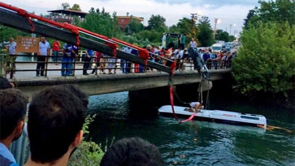 Rescuers worked overnight to pull people out of the water after the school bus plunged into a canal. (Twitter)