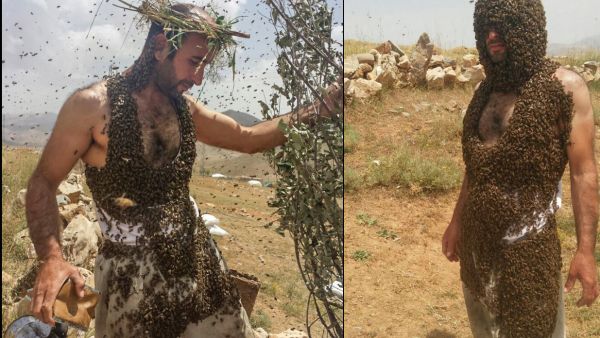 Abdulvahap Semo, a beekeeper from eastern Turkey, is attempting to break the world record for the number of bees covering a person. (Twitter/Daily Sabah)