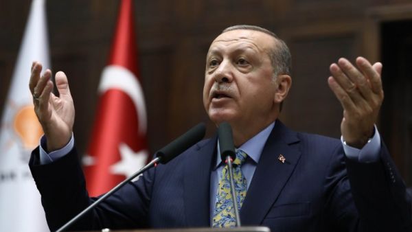 Turkish President Tayyip Erdogan addresses members of parliament of his ruling AK Party (AKP) during a meeting at the Turkish parliament in Ankara. (AFP/File)