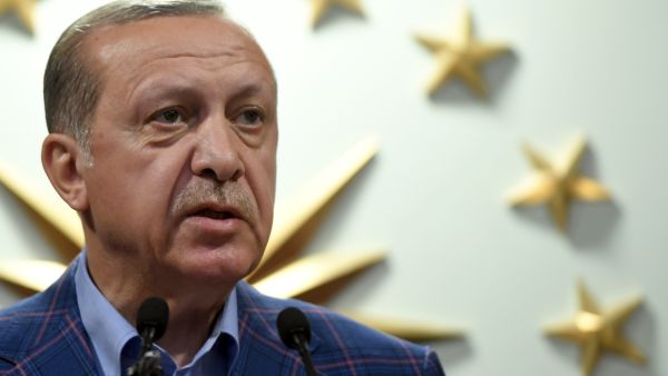 Four Cumhuriyet journalists remain behind bars. (AFP) 