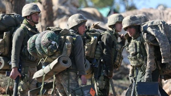 Turkish soldiers are deployed on Mount Bersaya, north of the Syrian town of Azaz near the border with Turkey. (AFP Photo)