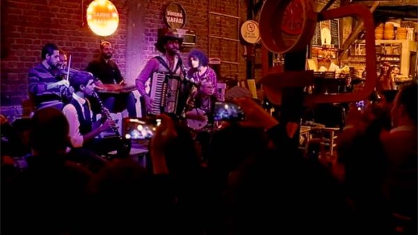 A band in Istanbul is combining American country music with Arabic folk tunes to raise money for refugees. (YouTube)