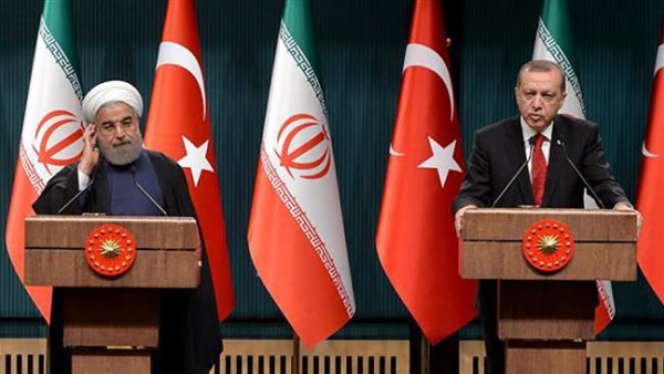 Turkish President Recep Tayyip Erdogan (R) speaks during a joint press conference with his Iranian counterpart Hassan Rouhani in Ankara. (AFP/ File)