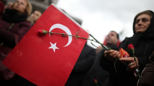 Head of the Nationalist Movement Party Devlet Bahceli described Erdogan’s proposal on naturalizing refugees as “irresponsible” and a threat to “social peace.” (AFP)