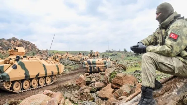 Turkish army tanks and troops gather near Hassa, in Hatay province, for push into Syria. (AFP/File)