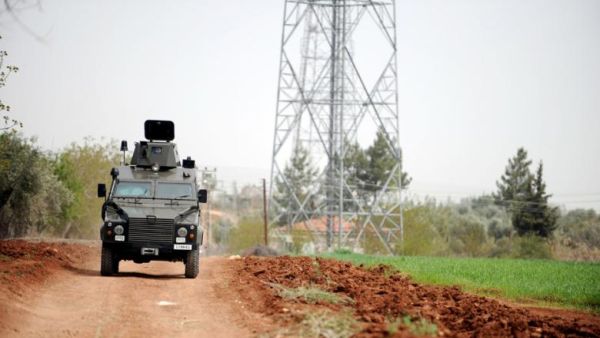 A Turkish army vehicle patrols near the border with Syria in Kilis, on 11 April 2012. (AFP/Bulent Kilic)