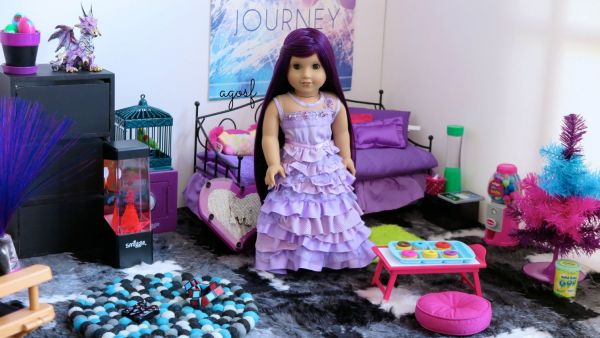 American Girl dolls come with collections of books and clothes that encourage strong characters for young girls. (YouTube)