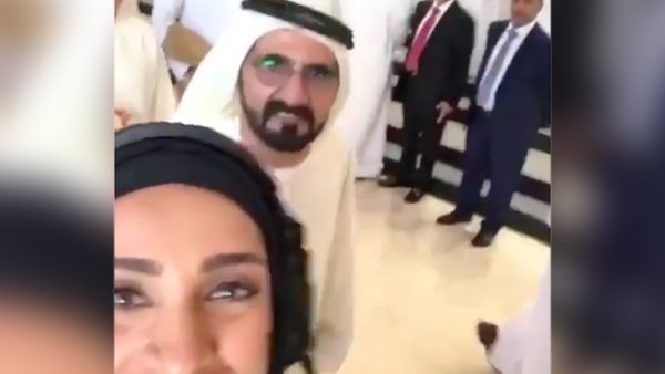 Sheikh Mohammed briefly popped into the frame as a woman filmed a selfie video, which then went viral on Instagram. (Screenshot via Instagram)