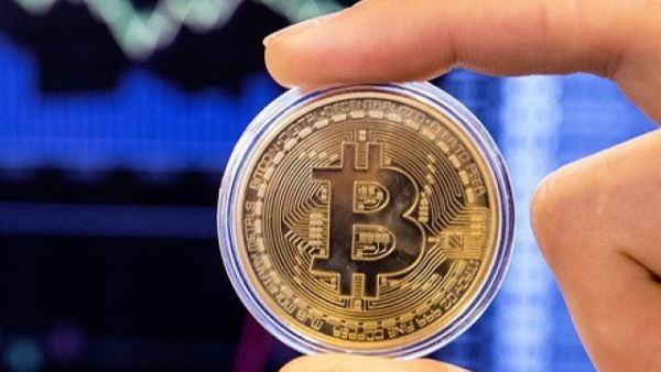 An employee of a digital currency trading company allegedly embezzled Dh800,000 from cryptocurrency platform. (AFP/ File Photo)