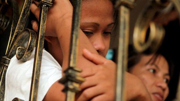 A Muslim maid from the Philippines waits to break her Ramadan fast at a shelter managed by Labour and Welfare officers after fleeing her employer's home due to mistreatment, August 13, 2010, in Dubai, United Arab Emirates (AFP)