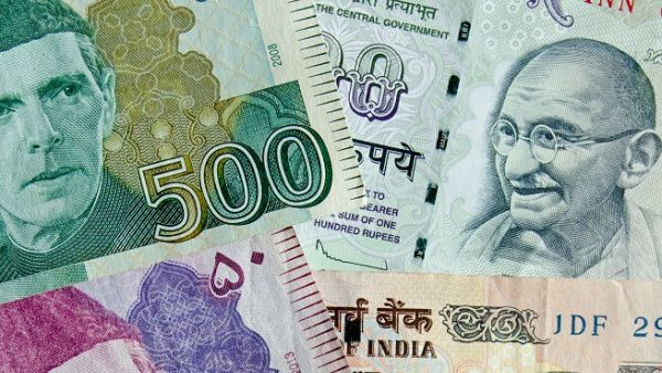 The Indian and Pakistani currencies have been consistently hitting new lows over the last few months with the former reaching 18.8 against the UAE dirham last month while the Pakistani rupee has plunged below 33. (Shutterstock)