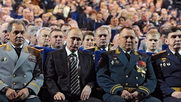 ussia's Minister of Defense Sergei Shoigu, left, and Russia's President Vladimir Putin, 2nd left, attend a gala at the State Kremlin Palace in Moscow. (AFP / MIKHAIL KLIMENTYEV)