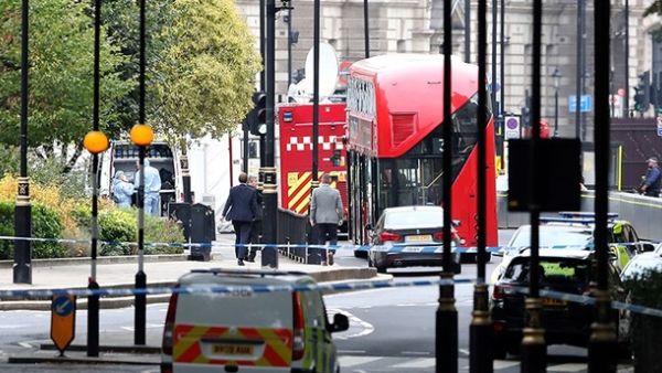 Police forensics officers outside the Houses of Parliament following an incident where a car crashed into barriers on Aug. 14, 2018. (AFP/ Photo)