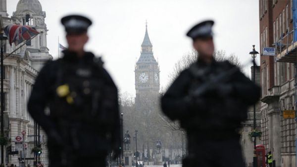 Armed police secure the area around the Houses of Parliament (AFP)