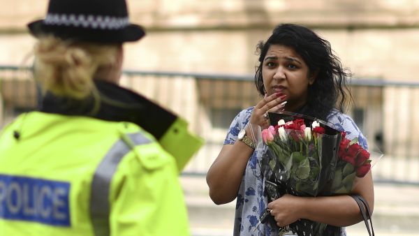British Prime Minister said the "cowardice of the attacker was met by the bravery of the emergency services and the people of Manchester". (AFP) 