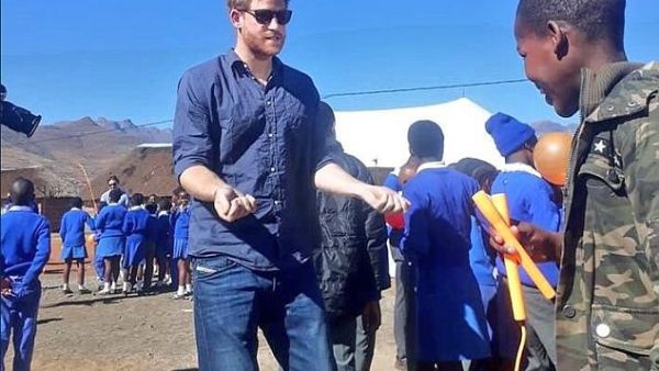 The Duke of Sussex, 33, looked relaxed as he met with local children at the Phelisanong Children’s Centre. (Facebook/Phelisanong Children’s Centre)