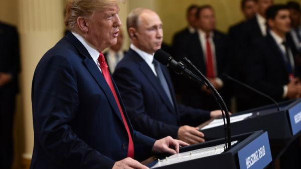 US President Donald Trump and Russia's President Vladimir Putin attend a joint press conference after a meeting at the Presidential Palace in Helsinki, on July 16, 2018. (Brendan SMIALOWSKI/ AFP)