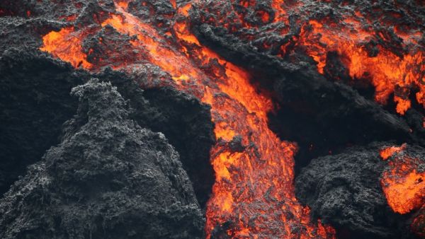 Lava flows at a lava fissure in the aftermath of eruptions from the Kilauea volcano on Hawaii's Big Island.(AFP/ File)