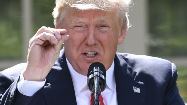 Around a quarter of residents in the Kingdom questioned by YouGov said the visit positively affected their impression of Trump, compared to 38 percent who said the visit made no difference. (AFP)
