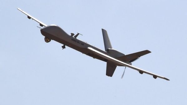 A US-made Reaper drone flies over Nigerien military airport Diori Hamani in Niamey in January 2015. [AFP/Getty/Dominique Faget]