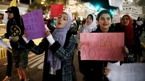 Protesters chant during a rally against travel ban at San Diego International Airport, on March 6, 2017 (AFP/Sandy Huffaker)