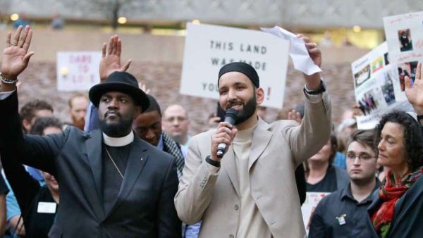 Imam Omar Suleiman (right) compared Trump's travel ban on several Middle Eastern countries to the denial of entry to Jewish refugees fleeing the Holocaust. (Facebook)