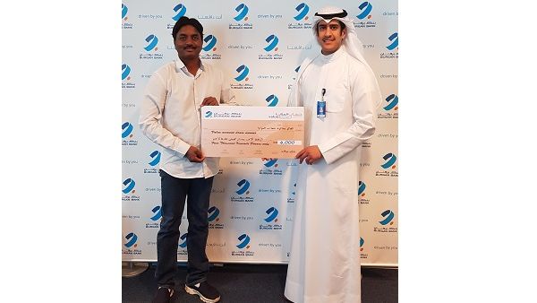 Chandra Sekhar Gembal, winner of the KD4,000 draw, receiving his cheque. Chandra Sekhar Gembal, winner of the KD4,000 draw, receiving his cheque.