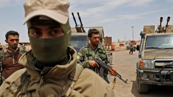 Members of the Syrian Democratic Forces gather at Al Tanak oil field as they prepare to relaunch a military campaign against ISIS. (AFP/File)
