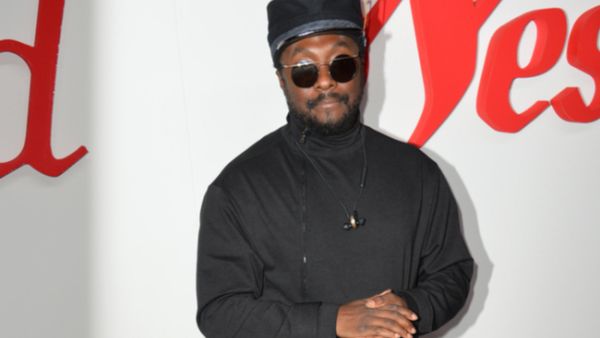 The Black Eyed Peas singer has admitted he'd love nothing more than to open or close the ceremony at the forthcoming international multi-sport event in his hometown (Source: Featureflash Photo Agency - Shutterstock)